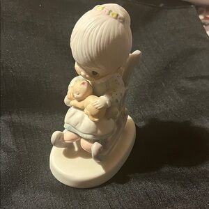 Charming Figurine with Child and Cat